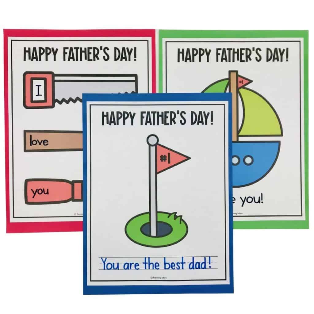 three Happy Father's Day signs on a table with tools, golfing, and a sailboat 