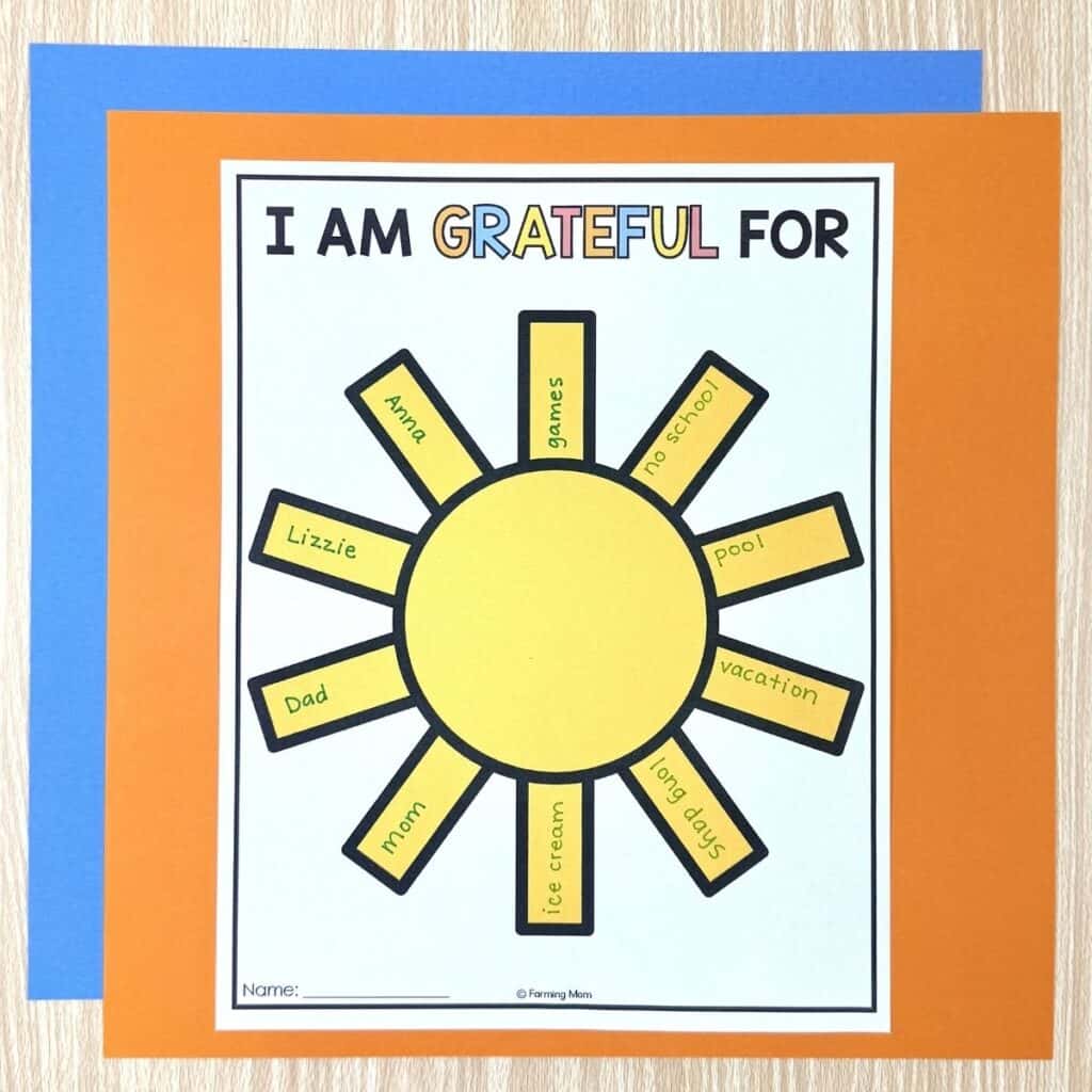printable gratitude sun craft for kids assembled on paper with I am grateful for prompts
